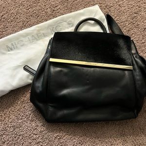 Michaela Kors black leather medium size backpack purse, never used- vintage